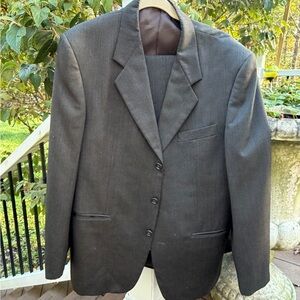 Charcoal grey men’s suit jacket and pants